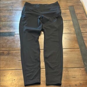 Athleta Black High-Waisted Leggings with pockets. Size medium